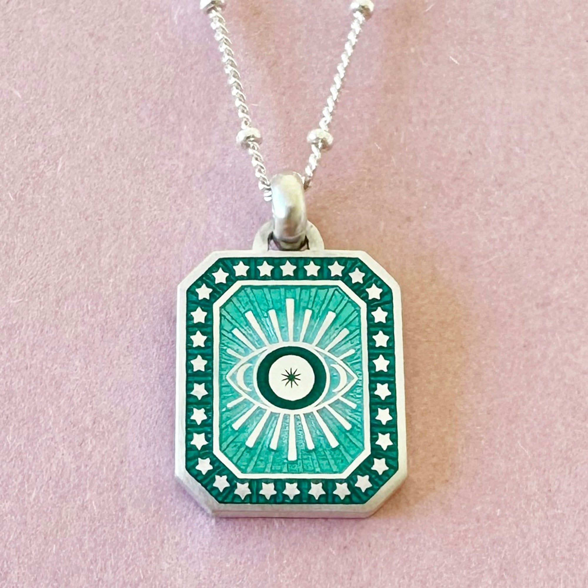 Vitreous Enamel Evil Eye Necklace by Sally Clay close up hanging