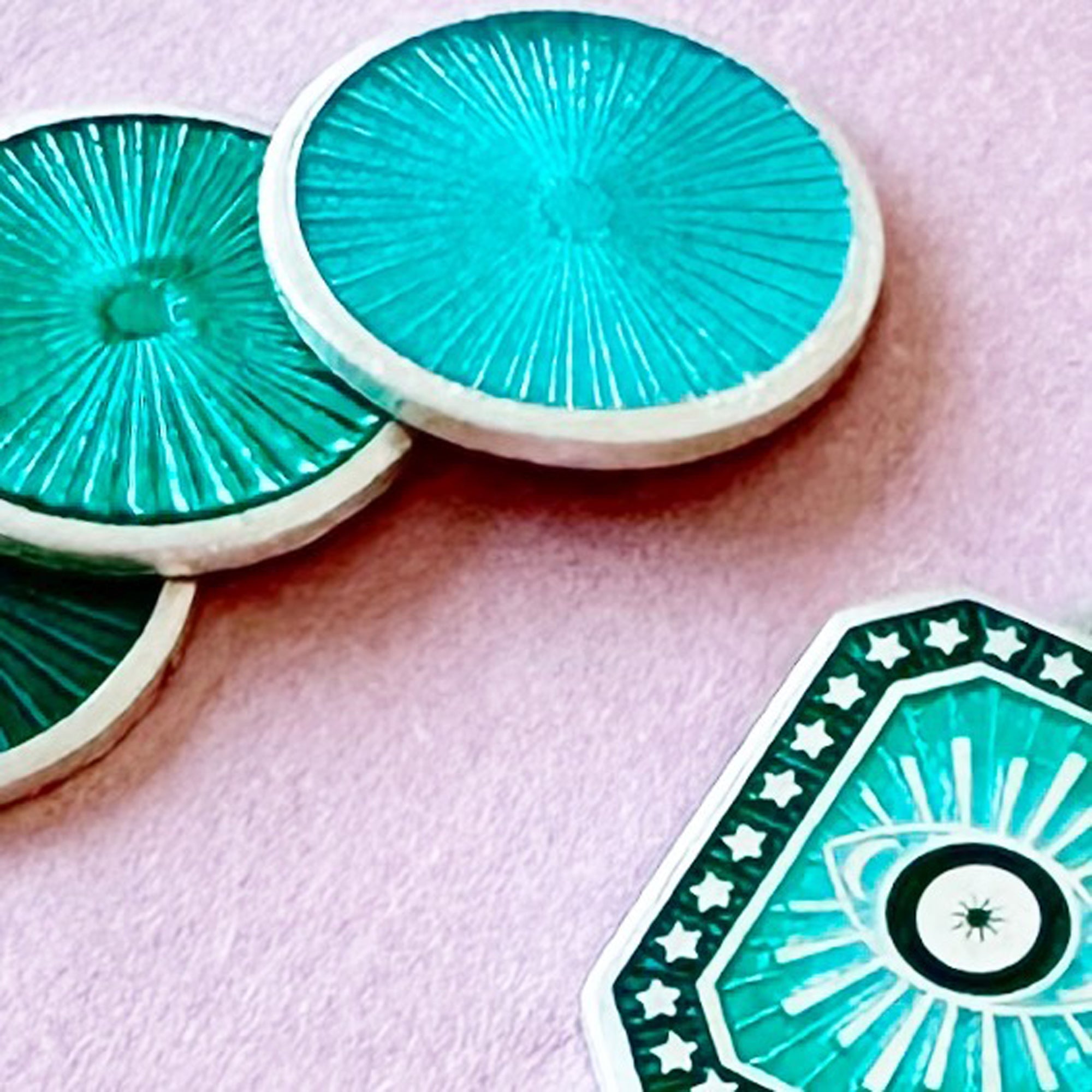 Vitreous Enamel Evil Eye Necklace by Sally Clay Jewellery close up of enamel colourways