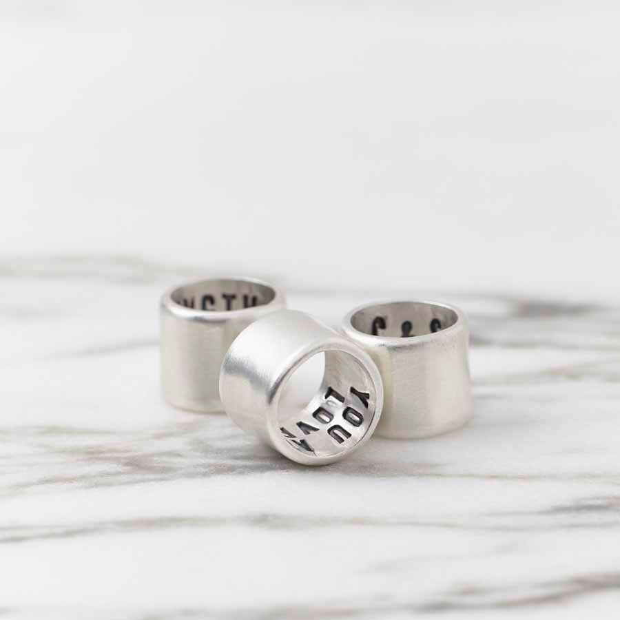 Individual Secret Message Storyteller beads by Sally Clay jewellery stamped on the inside with a secret message