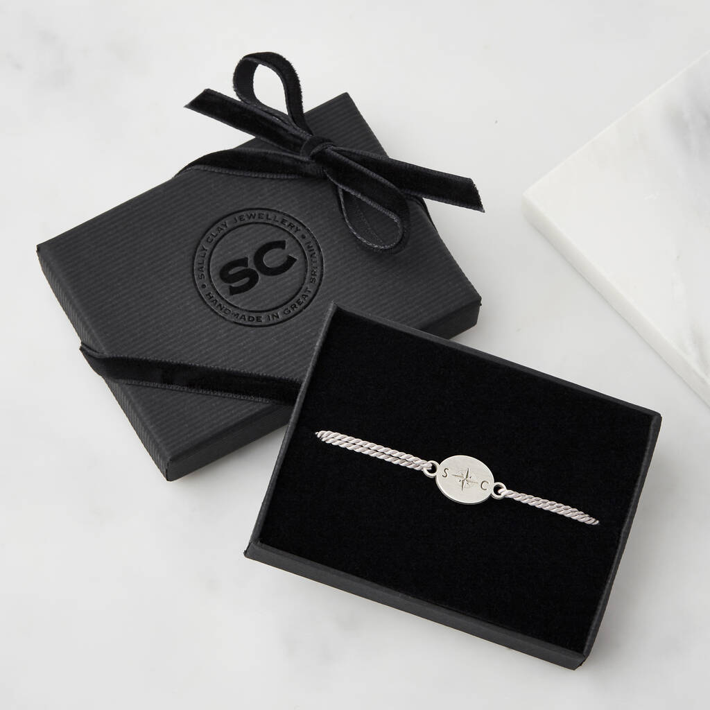 Personalised silver and silk father and child compass bracelet set engraved with initials in the box