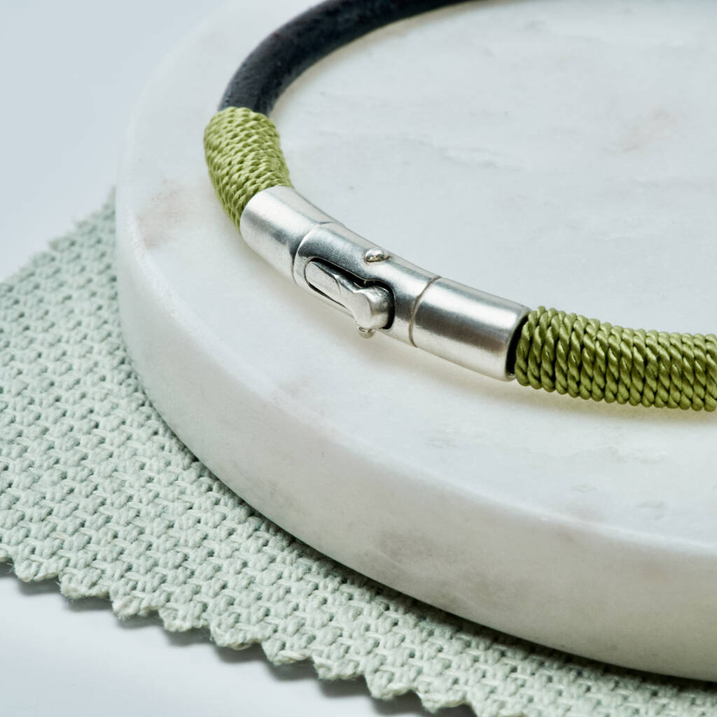 close up of leather and olive silk bracelet with sterling silver clasp by Sally Clay Jewellery