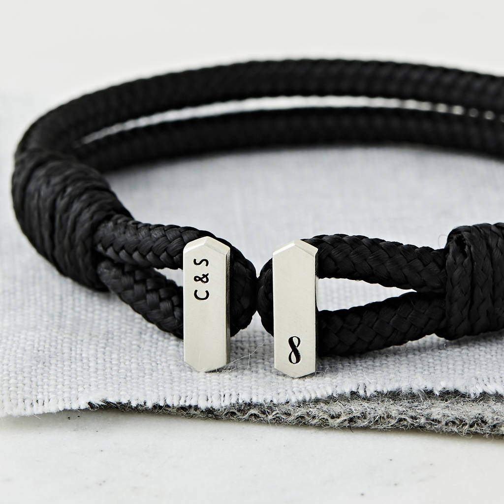 men's personalised sterling silver and black cord bracelet personalised with an infinity sign and initials by Sally Clay Jewellery close up
