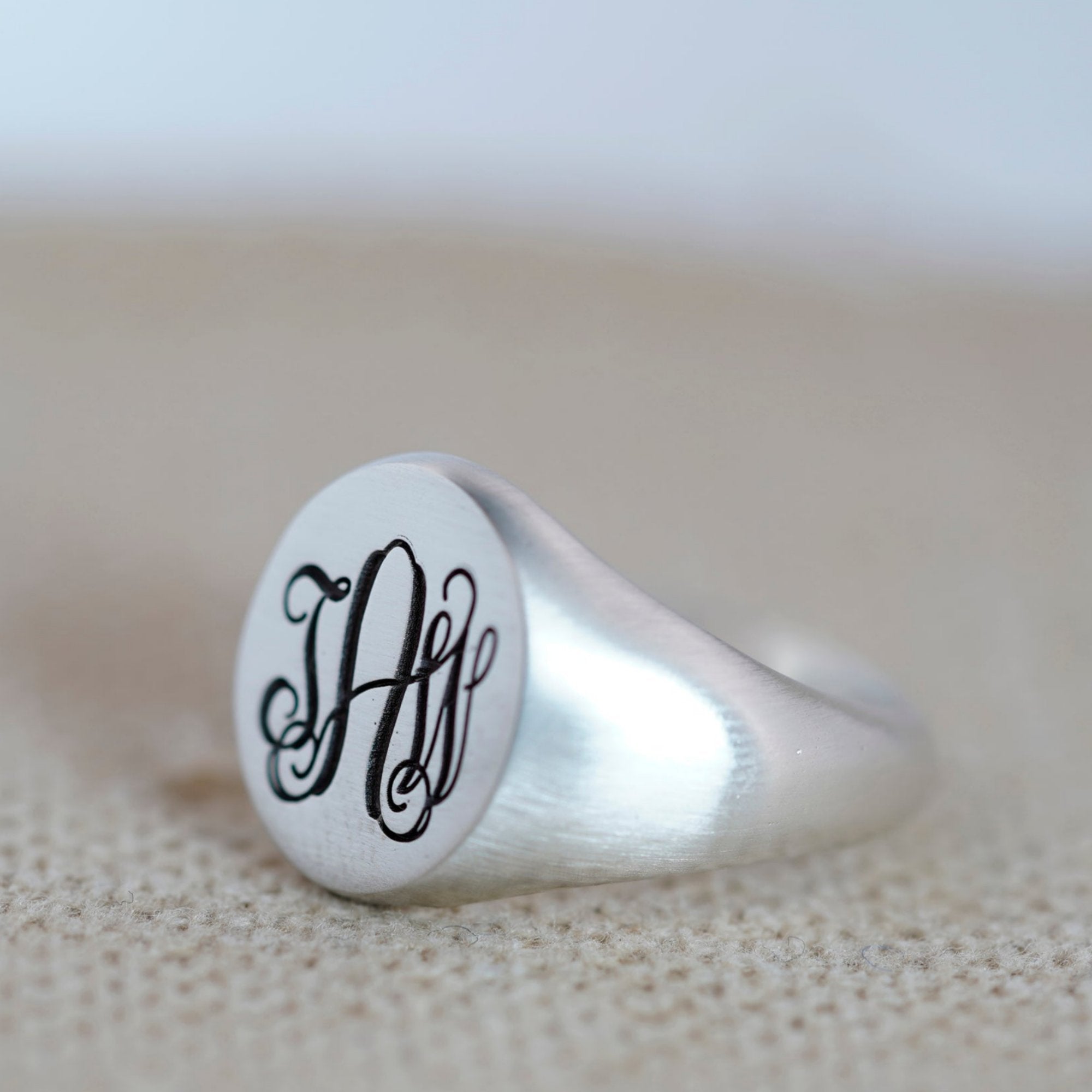 Sterling silver monogram signet ring with custom engraved 3-initial design 