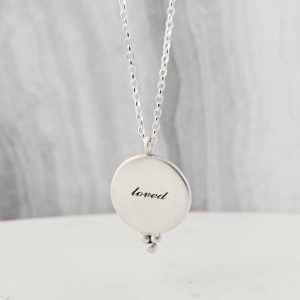 Solid Silver necklace engraved with "Loved"