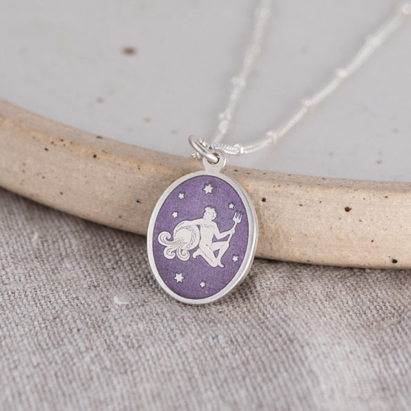 Silver and Lilac Enamel Zodiac Star Sign Pendant Necklace on Linen